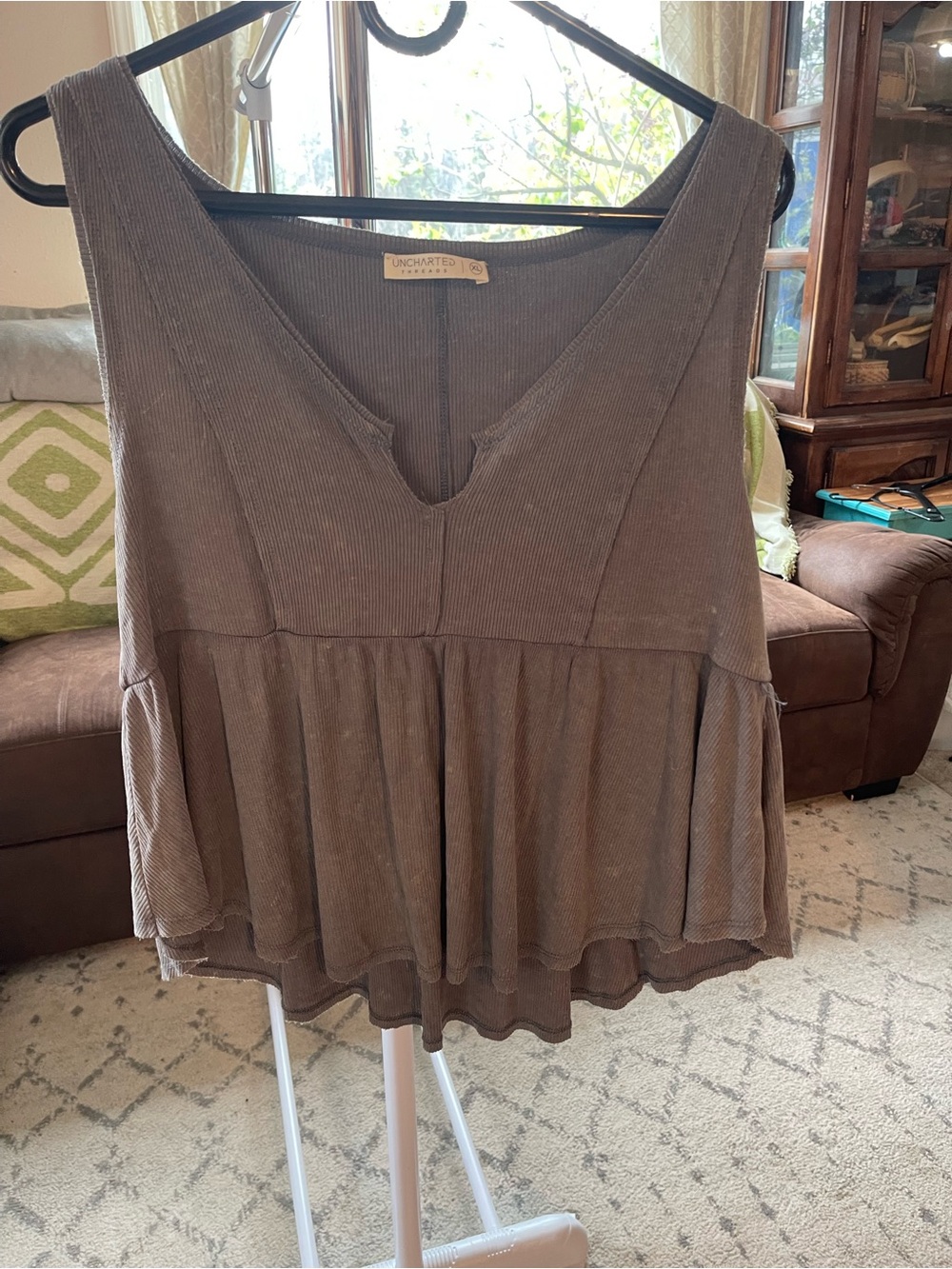 3 tank tops. All fit like large/smaller xl. Uncharted, old navy, dip.